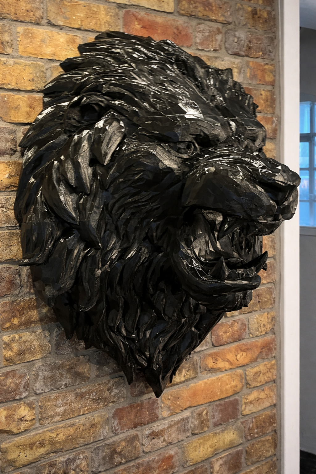 Wandskulptur Löwe